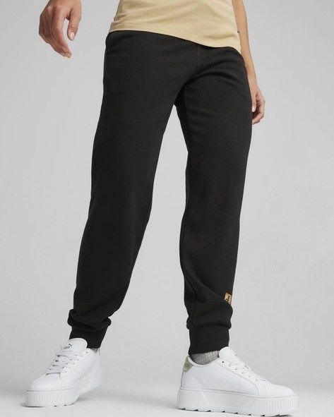 Product: PUMA - PANTALONE NERO DA DONNA CON LOGO MACULATO ESS+ ANIMAL TR 677929-01 (1 of 3)