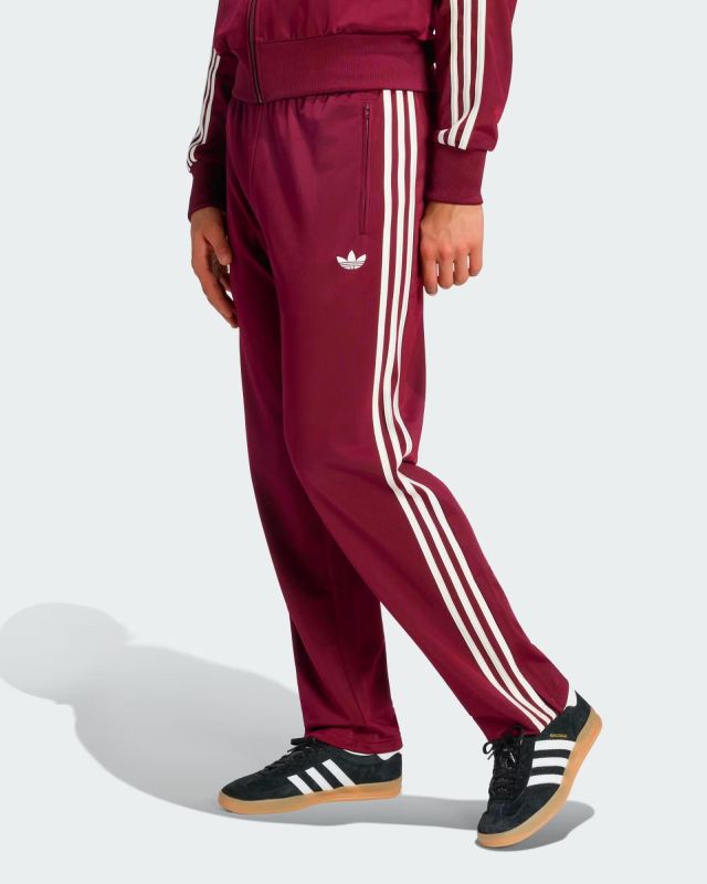 Prodotto: ADIDAS -PANTALONE TUTA FIREBIRD ROSSO SCURO CON  BANDE PANNA, KX6923