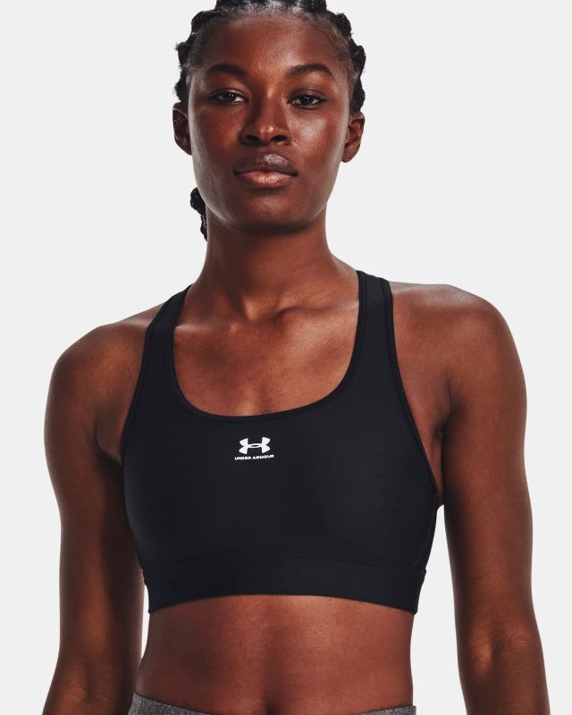 Prodotto: UNDER ARMOUR - Top nero ultra aderente in tessuto traspirante con logo bianco