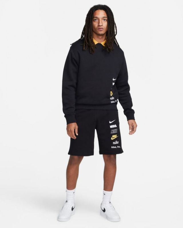 Prodotto: NIKE - Pantalone corto da uomo nero con logo bianco e giallo
