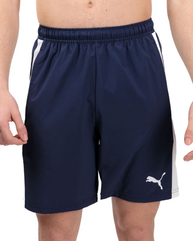 Prodotto: PUMA - Pantaloncini da padel uomo blu in tessuto traspirante con logo bianco