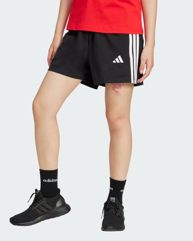 Prodotto: ADIDAS - PANTALONCINO DONNA NERO CON BANDE BIANCHE SINGLE JERSEY 7 POLLICI - JD0908