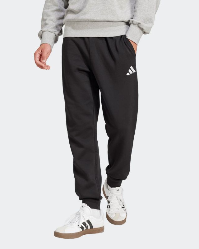 Prodotto: ADIDAS - PANTALONI TUTA DA UOMO NERI  FELPATI FEELCOZY -JE3815