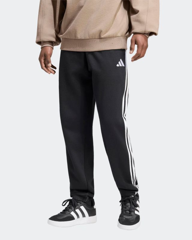 Prodotto: ADIDAS -PANTALONE DA JOGGING AFFUSOLATI CON RISVOLTO IN FRENCH TERRY A 3 STRISCE ESSENTIALS NERO  CON DETTAGLI BIANCHI DA UOMO, KY6533