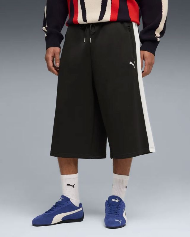 Prodotto: PUMA - PANTALONE TUTA 3/4 NERO CON BANDE BIANCHE T7 RELAXED - DA UOMO, 635359-01