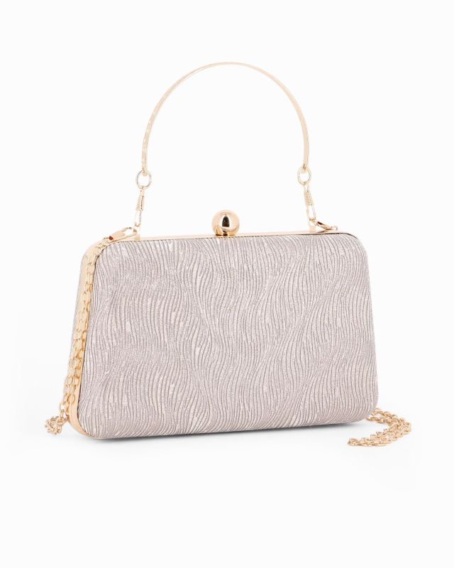 Prodotto: DIVAS - Clutch champagne rigida effetto ondulato con manico e pomello