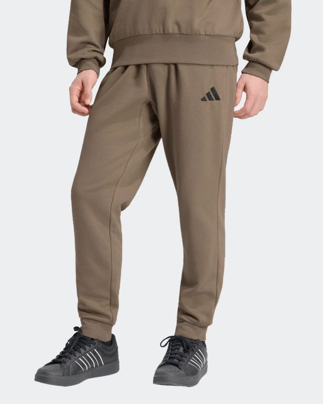 Prodotto: ADIDAS - PANTALONE TUTA FEELCOZY  MARRONI DA UOMO, KF2380