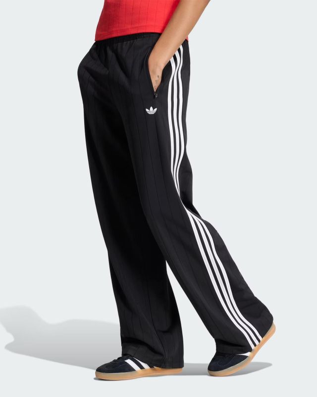 Prodotto: ADIDAS -PANTALONE DA ALLENAMENTO GESSATI FIREBIRD NERO CON 3 BANDE BIANCHE DA DONNA, KS6787
