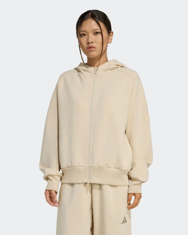 Prodotto: ADIDAS - GIACCA DA ALLENAMENTO CON CAPPUCCIO FULL ZIP SOFT LUX HOODIE BEIGE DA DONNA,  KF8339