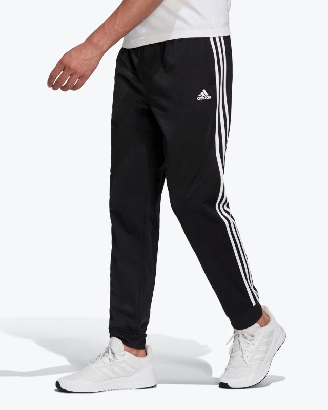 Prodotto: ADIDAS - PANTALONI DA ALLENAMENTO PRIMEGREEN ESSENTIALS WARM-UP TAPERED 3-STRIPES - H46105