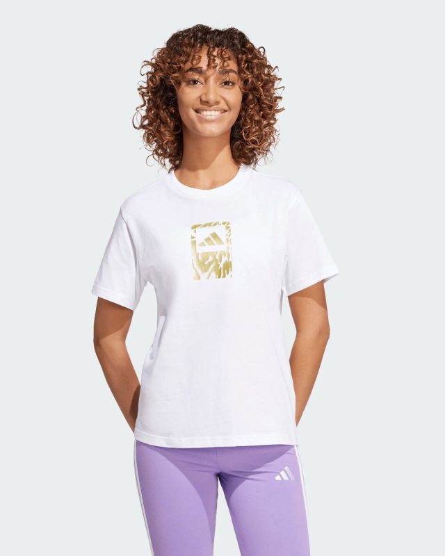 Prodotto: ADIDAS -T-SHIRT DONNA MEZZA MANICA BIANCA E STAMPA METALLICA TEC -JM0339