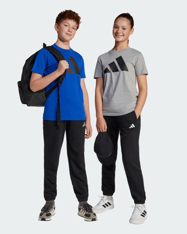 Prodotto: ADIDAS - PANTALONI DA TUTA JUNIOR NERI ESSENTIALS SLIM FLEECE PANTS - JC9765