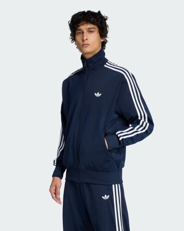 Prodotto: ADIDAS - GIACCA SPORTIVA FIREBIRD FULL ZIP BLU CON DETTAGLI BIANCHI DA UOMO, KT5055